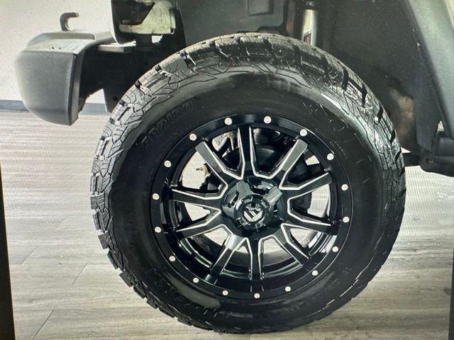 used 2018 Jeep Wrangler JK Unlimited car, priced at $24,992