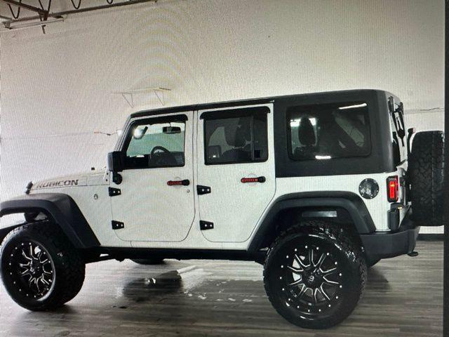 used 2018 Jeep Wrangler JK Unlimited car, priced at $24,992