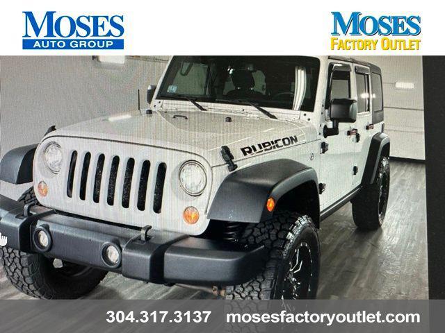 used 2018 Jeep Wrangler JK Unlimited car, priced at $24,992
