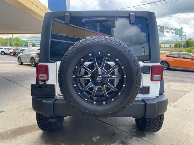 used 2018 Jeep Wrangler JK Unlimited car, priced at $24,839