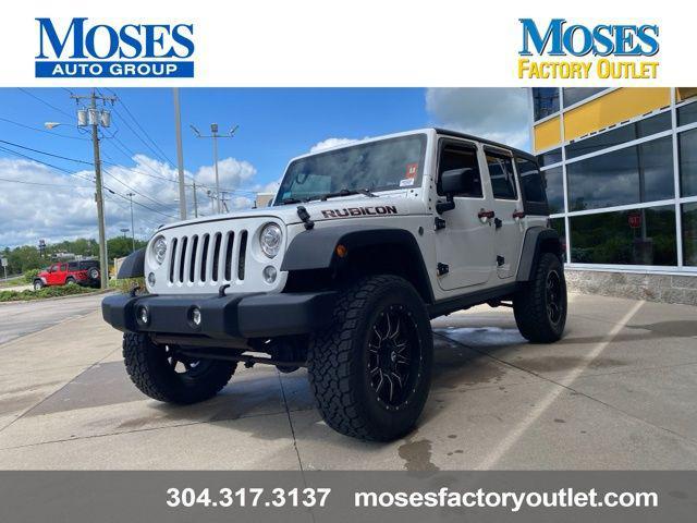 used 2018 Jeep Wrangler JK Unlimited car, priced at $24,839