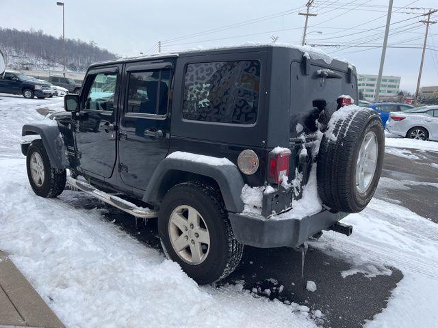 used 2013 Jeep Wrangler Unlimited car, priced at $14,026