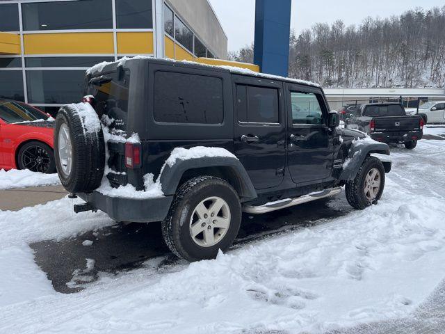 used 2013 Jeep Wrangler Unlimited car, priced at $14,026