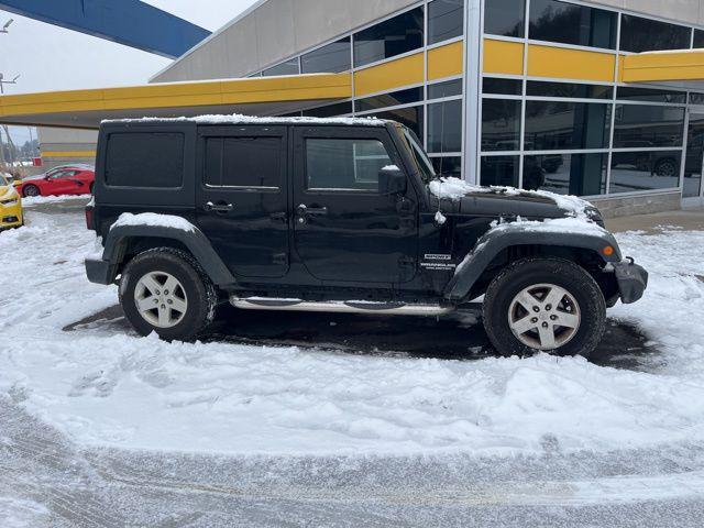 used 2013 Jeep Wrangler Unlimited car, priced at $14,026