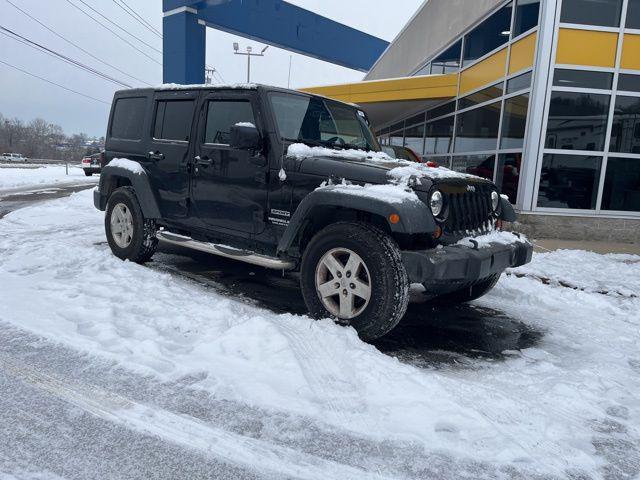 used 2013 Jeep Wrangler Unlimited car, priced at $14,026