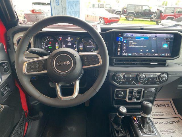 used 2024 Jeep Wrangler 4xe car, priced at $37,278