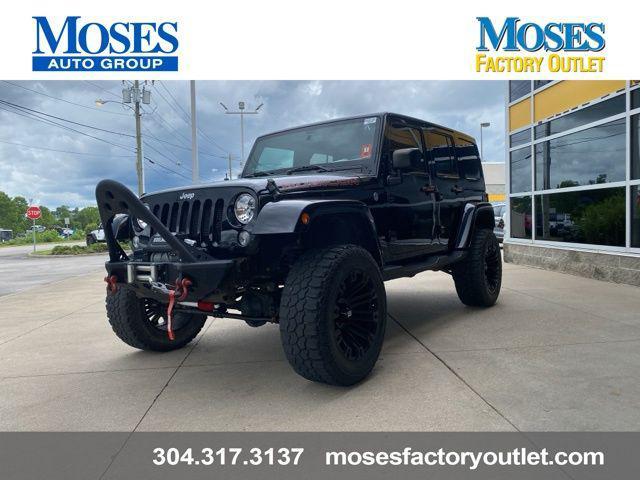 used 2014 Jeep Wrangler Unlimited car, priced at $21,884