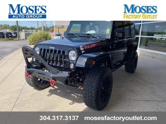 used 2014 Jeep Wrangler Unlimited car, priced at $24,073