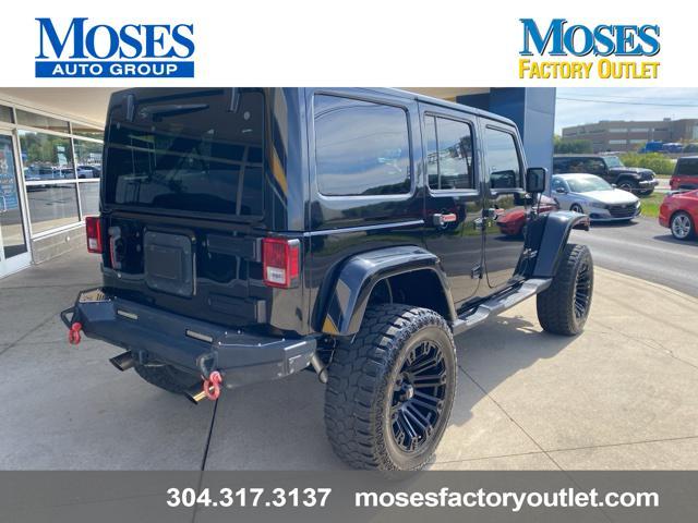 used 2014 Jeep Wrangler Unlimited car, priced at $24,073