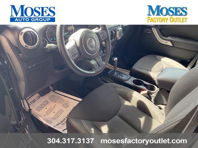 used 2014 Jeep Wrangler Unlimited car, priced at $24,073
