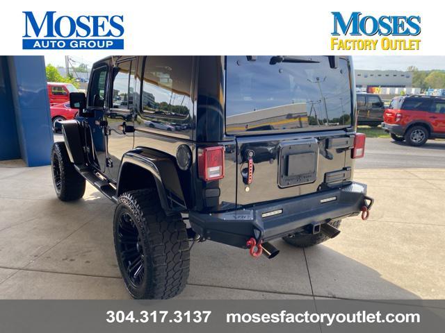 used 2014 Jeep Wrangler Unlimited car, priced at $24,073