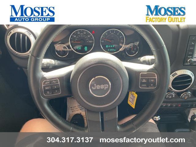 used 2014 Jeep Wrangler Unlimited car, priced at $24,073