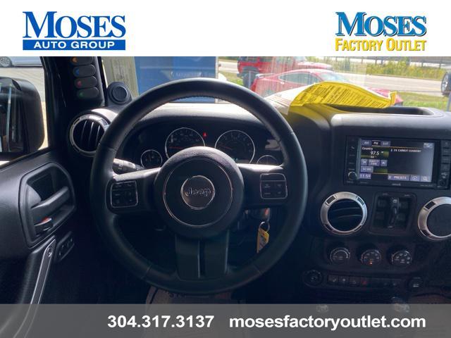 used 2014 Jeep Wrangler Unlimited car, priced at $24,073