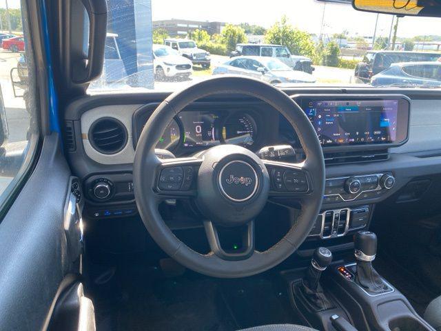 used 2024 Jeep Wrangler 4xe car, priced at $31,676