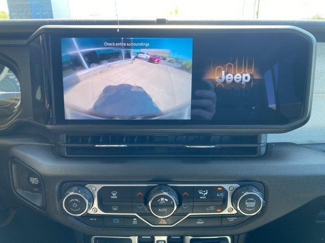 used 2024 Jeep Wrangler 4xe car, priced at $34,164