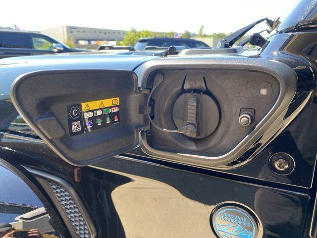 used 2024 Jeep Wrangler 4xe car, priced at $34,164