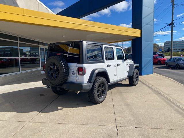 used 2022 Jeep Wrangler Unlimited car, priced at $33,027