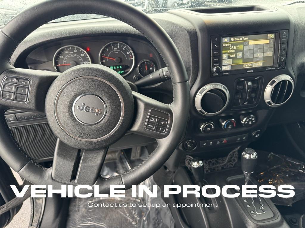 used 2015 Jeep Wrangler Unlimited car, priced at $23,500