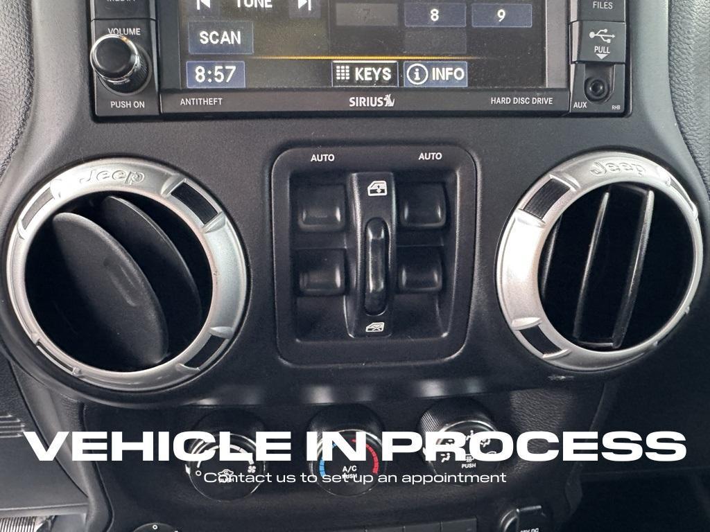 used 2015 Jeep Wrangler Unlimited car, priced at $23,500