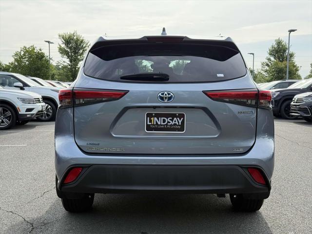 used 2020 Toyota Highlander Hybrid car, priced at $34,997