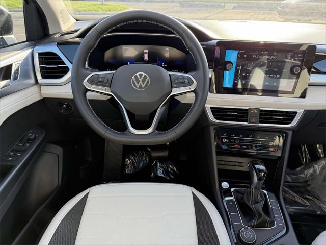new 2025 Volkswagen Taos car, priced at $29,986