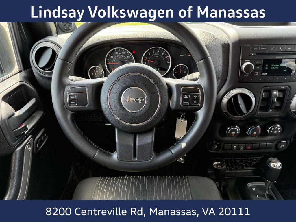 used 2011 Jeep Wrangler Unlimited car, priced at $15,997