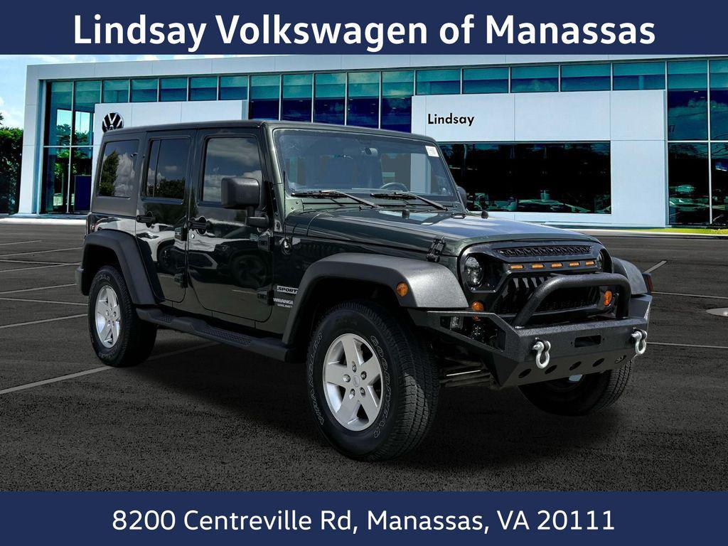 used 2011 Jeep Wrangler Unlimited car, priced at $15,997