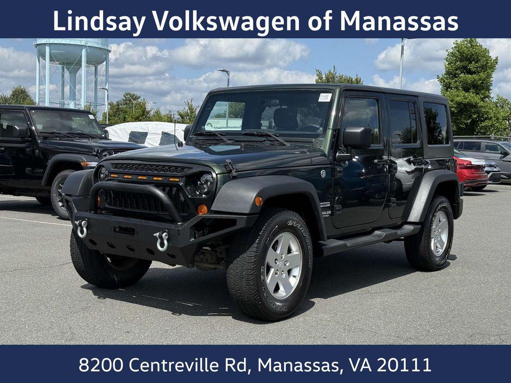 used 2011 Jeep Wrangler Unlimited car, priced at $15,997