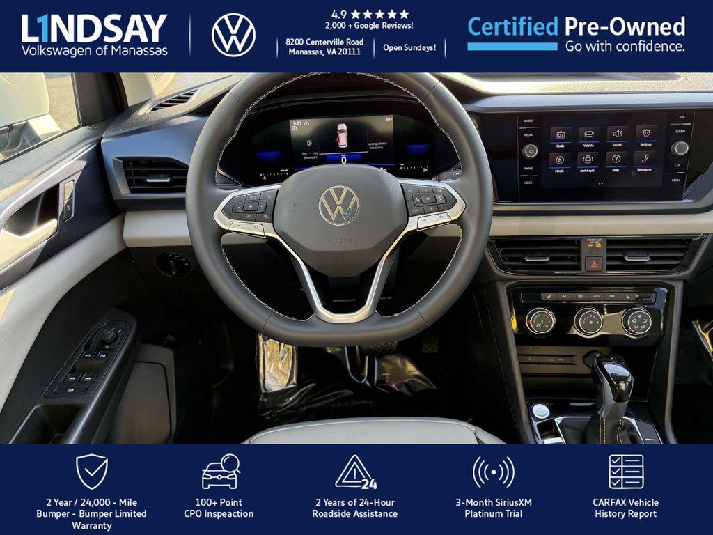 used 2023 Volkswagen Taos car, priced at $22,997