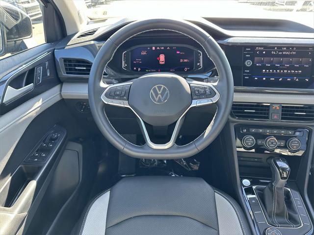 used 2023 Volkswagen Taos car, priced at $28,577