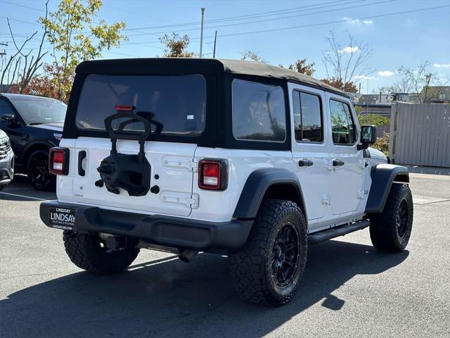 used 2018 Jeep Wrangler Unlimited car, priced at $23,577