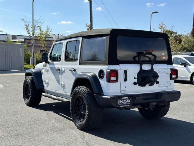 used 2018 Jeep Wrangler Unlimited car, priced at $23,577