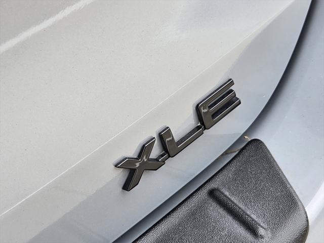 used 2024 Toyota Highlander Hybrid car, priced at $46,888