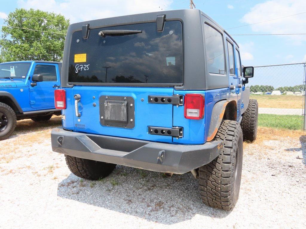 used 2014 Jeep Wrangler Unlimited car, priced at $18,499