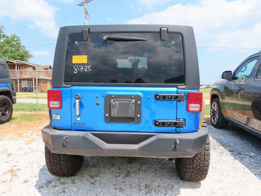 used 2014 Jeep Wrangler Unlimited car, priced at $18,499