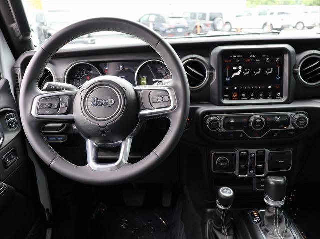 used 2023 Jeep Wrangler 4xe car, priced at $31,699