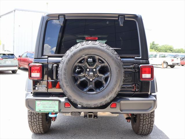 used 2023 Jeep Wrangler 4xe car, priced at $30,699