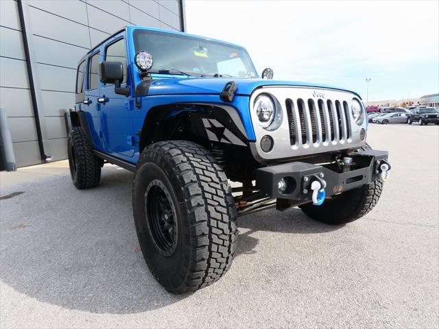 used 2014 Jeep Wrangler Unlimited car, priced at $17,497