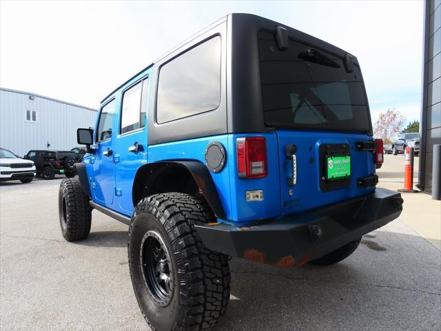 used 2014 Jeep Wrangler Unlimited car, priced at $17,497