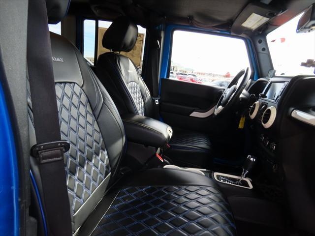 used 2014 Jeep Wrangler Unlimited car, priced at $17,497