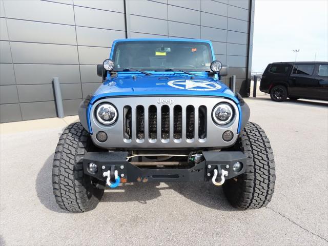 used 2014 Jeep Wrangler Unlimited car, priced at $17,497