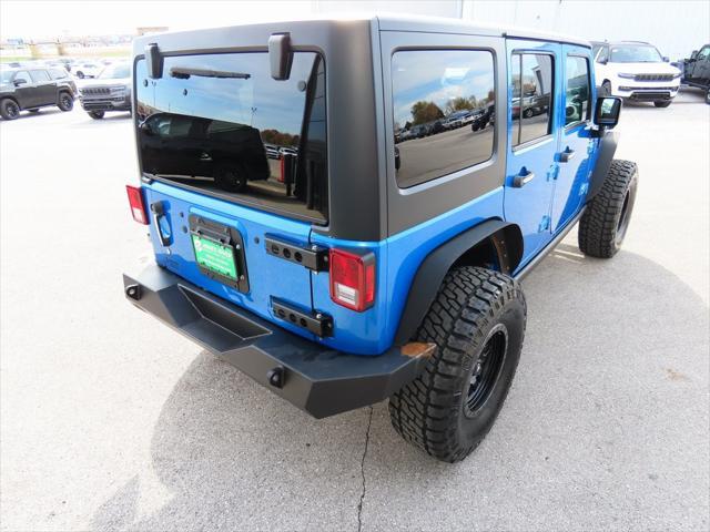 used 2014 Jeep Wrangler Unlimited car, priced at $17,497