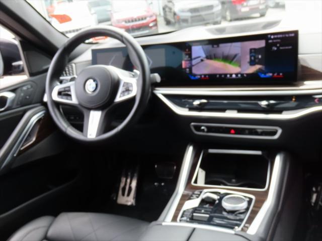 used 2024 BMW X6 car, priced at $64,128