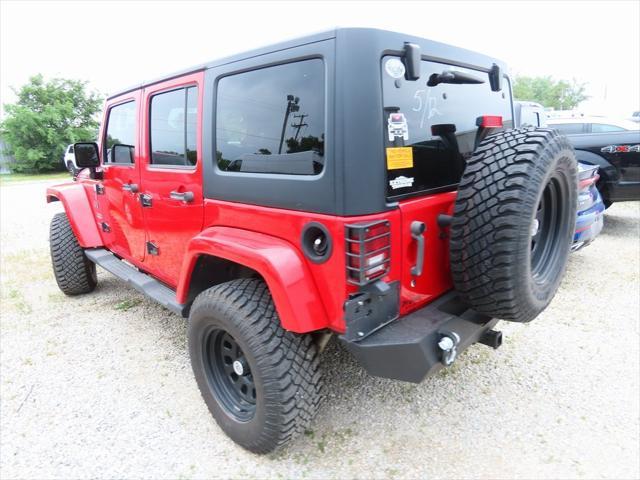 used 2011 Jeep Wrangler Unlimited car, priced at $16,295