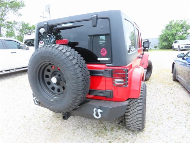 used 2011 Jeep Wrangler Unlimited car, priced at $16,295