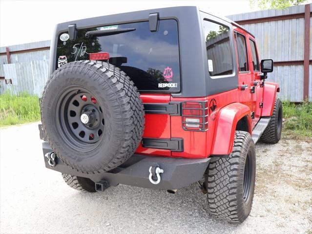 used 2011 Jeep Wrangler Unlimited car, priced at $15,499