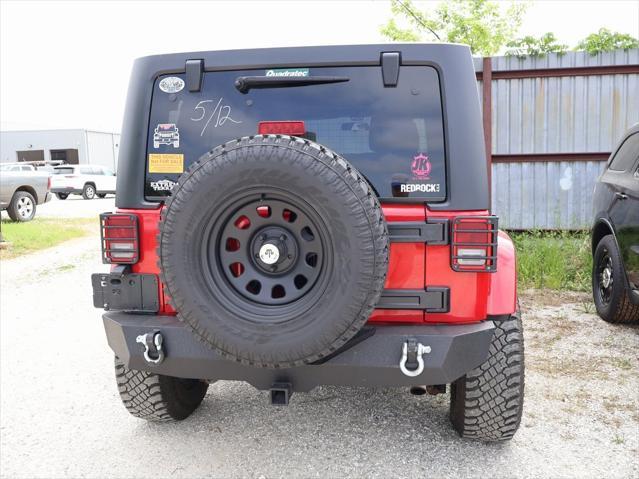 used 2011 Jeep Wrangler Unlimited car, priced at $15,499