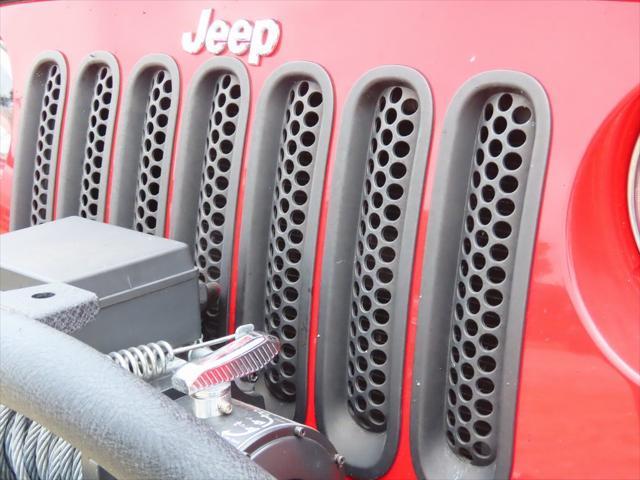 used 2011 Jeep Wrangler Unlimited car, priced at $16,295