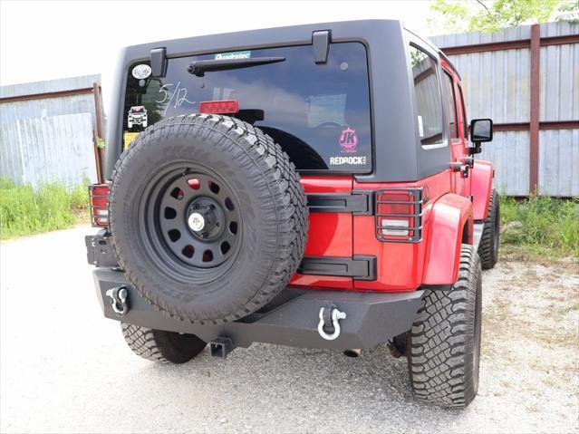 used 2011 Jeep Wrangler Unlimited car, priced at $15,499