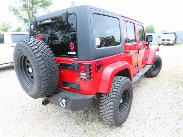 used 2011 Jeep Wrangler Unlimited car, priced at $16,295